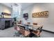 Bright conference area showcases modern decor, a glass table, and a cozy fireplace for a professional setting at 120 E Rio Salado Pkwy # 101, Tempe, AZ 85281