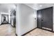 Well-lit hallway with modern elevators and secure entryways for residents at 120 E Rio Salado Pkwy # 101, Tempe, AZ 85281