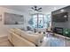 Comfortable living room features a fireplace, large windows, modern decor, and a cozy seating arrangement at 120 E Rio Salado Pkwy # 101, Tempe, AZ 85281