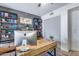 Bright office with a wooden desk, ceiling fan, and hardwood floors at 120 E Rio Salado Pkwy # 101, Tempe, AZ 85281