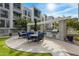 Inviting outdoor kitchen with built-in grill and ample seating under a charming pergola at 120 E Rio Salado Pkwy # 101, Tempe, AZ 85281