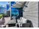 An outdoor lounge with plush seating and a wooden table, perfect for relaxing and entertaining at 120 E Rio Salado Pkwy # 101, Tempe, AZ 85281