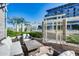 Tranquil patio area with cozy seating, lush landscaping, and gated access for privacy and security at 120 E Rio Salado Pkwy # 101, Tempe, AZ 85281