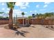 Backyard featuring mature desert landscaping and covered patio at 1238 E Cambridge Ave, Phoenix, AZ 85006