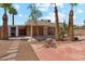 Backyard featuring desert landscaping and covered patio at 1238 E Cambridge Ave, Phoenix, AZ 85006