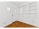 Bright entryway with built-in shelving and cabinets offering ample storage space at 1238 E Cambridge Ave, Phoenix, AZ 85006