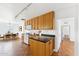 Bright eat-in kitchen boasts solid surface counters, stainless appliances, and convenient wine rack at 1238 E Cambridge Ave, Phoenix, AZ 85006