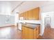 Bright eat-in kitchen features solid surface counters, and white appliances at 1238 E Cambridge Ave, Phoenix, AZ 85006