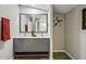 Bathroom features a double vanity with decorative mirrors at 13050 N Breeze Way, Maricopa, AZ 85139