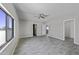 Spacious bedroom with neutral tones, vaulted ceiling, and stylish ceiling fan at 13050 N Breeze Way, Maricopa, AZ 85139