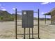 Outdoor electrical box on a desert lot against a backdrop of trees and mountains at 13050 N Breeze Way, Maricopa, AZ 85139