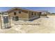Exterior view showing new power panel and new AC unit at 13050 N Breeze Way, Maricopa, AZ 85139