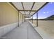 A long covered patio area, offering an ideal outdoor living space with extended awning at 13050 N Breeze Way, Maricopa, AZ 85139