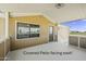 Inviting covered patio, offering a cozy outdoor space for relaxation and enjoyment at 13050 N Breeze Way, Maricopa, AZ 85139