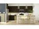 Modern kitchen with dark cabinetry, stainless steel appliances, and a stylish island with seating at 14949 W Cottontail Ln, Surprise, AZ 85387