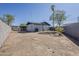Spacious backyard featuring mature trees, and a fenced perimeter providing privacy at 1616 E Pecan Rd, Phoenix, AZ 85040