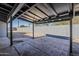 Covered patio with brick flooring in backyard providing an outdoor entertaining and relaxation area at 1616 E Pecan Rd, Phoenix, AZ 85040