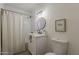 Cozy bathroom with a shower, modern fixtures, and neutral tones creating a serene atmosphere at 1616 E Pecan Rd, Phoenix, AZ 85040