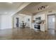 Open kitchen features stainless steel appliances, white cabinetry and a dining area at 1616 E Pecan Rd, Phoenix, AZ 85040