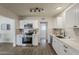 Bright kitchen with stainless steel appliances and white shaker cabinets at 1616 E Pecan Rd, Phoenix, AZ 85040