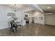 Open kitchen features stainless steel appliances, white cabinetry and a dining area at 1616 E Pecan Rd, Phoenix, AZ 85040