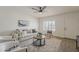 Bright living room with neutral palette and shuttered windows at 1616 E Pecan Rd, Phoenix, AZ 85040