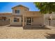 Charming backyard with covered patio provides shade and outdoor enjoyment at 17493 N Costa Brava Ave, Maricopa, AZ 85139