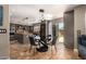 Dining area attached to the kitchen with stone floors and backyard views at 1751 W Mulberry Dr, Chandler, AZ 85286