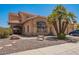 Charming home featuring a well-maintained front yard with desert landscaping and a prominent palm tree at 1751 W Mulberry Dr, Chandler, AZ 85286
