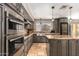 Kitchen with stainless steel appliances, granite countertops, and a built-in wine cooler at 1751 W Mulberry Dr, Chandler, AZ 85286