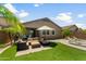 Inviting backyard featuring comfortable seating, a patio area, and well-maintained landscaping at 1812 E Parkside E Ln, Phoenix, AZ 85024