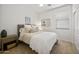 Neutral bedroom with carpet and a cozy bed adorned with soft pillows and a throw blanket at 1812 E Parkside E Ln, Phoenix, AZ 85024