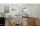 Inviting living room with comfortable seating, ample natural light, and elegant decor, creating a warm and welcoming space at 1812 E Parkside E Ln, Phoenix, AZ 85024