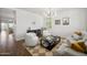 Bright living room featuring modern furnishings, stylish decor, and a cozy atmosphere for relaxation and entertaining at 1812 E Parkside E Ln, Phoenix, AZ 85024