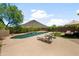 Relaxing backyard pool with lounge chairs and a mountain view providing a resort-like setting at 1812 E Parkside E Ln, Phoenix, AZ 85024