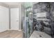 Modern bathroom with a frameless glass shower, marble surround, and tiled shower niche at 1918 E Megan St, Gilbert, AZ 85295
