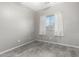 Neutral bedroom with stylish vinyl floor, window, and serene ambiance at 1918 E Megan St, Gilbert, AZ 85295