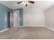 Main bedroom with ensuite bath access, neutral tones, and vaulted ceiling at 1918 E Megan St, Gilbert, AZ 85295