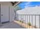 A cozy balcony area features stucco walls, metal railings, and outdoor storage, perfect for relaxing outdoors at 220 N 22Nd Pl # 2036, Mesa, AZ 85213