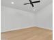 Spacious bedroom featuring a ceiling fan and light, bright and airy interior at 220 N 22Nd Pl # 2036, Mesa, AZ 85213