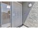 Close up of a security door with a window and stucco wall at 220 N 22Nd Pl # 2036, Mesa, AZ 85213