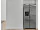 Stainless steel refrigerator with water dispenser complements the sleek, modern kitchen design at 220 N 22Nd Pl # 2036, Mesa, AZ 85213