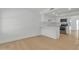 Modern kitchen with white cabinets, stainless steel appliances and an island with a sink at 220 N 22Nd Pl # 2036, Mesa, AZ 85213