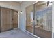 Covered patio featuring sliding glass doors with views of the neighborhood beyond at 220 N 22Nd Pl # 2036, Mesa, AZ 85213