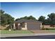 Charming single-story home with desert landscaping and a two-car garage, perfect for modern living at 23219 W Marguerite Ave, Buckeye, AZ 85326
