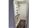 Walk-in closet with custom built-in shelving at 3329 W Ross W Ave, Phoenix, AZ 85027