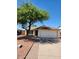 Charming single-story home with a well-maintained front yard and attached two-car garage, radiating curb appeal at 3329 W Ross W Ave, Phoenix, AZ 85027