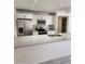 Modern kitchen featuring stainless steel appliances, granite countertops, and white cabinets at 3329 W Ross W Ave, Phoenix, AZ 85027
