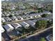 Aerial view shows the house location within a community, near a park with mature trees at 3404 E Lavey Ln, Phoenix, AZ 85032