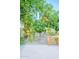 View of lush backyard showcasing mature pomegranite trees at 3404 E Lavey Ln, Phoenix, AZ 85032